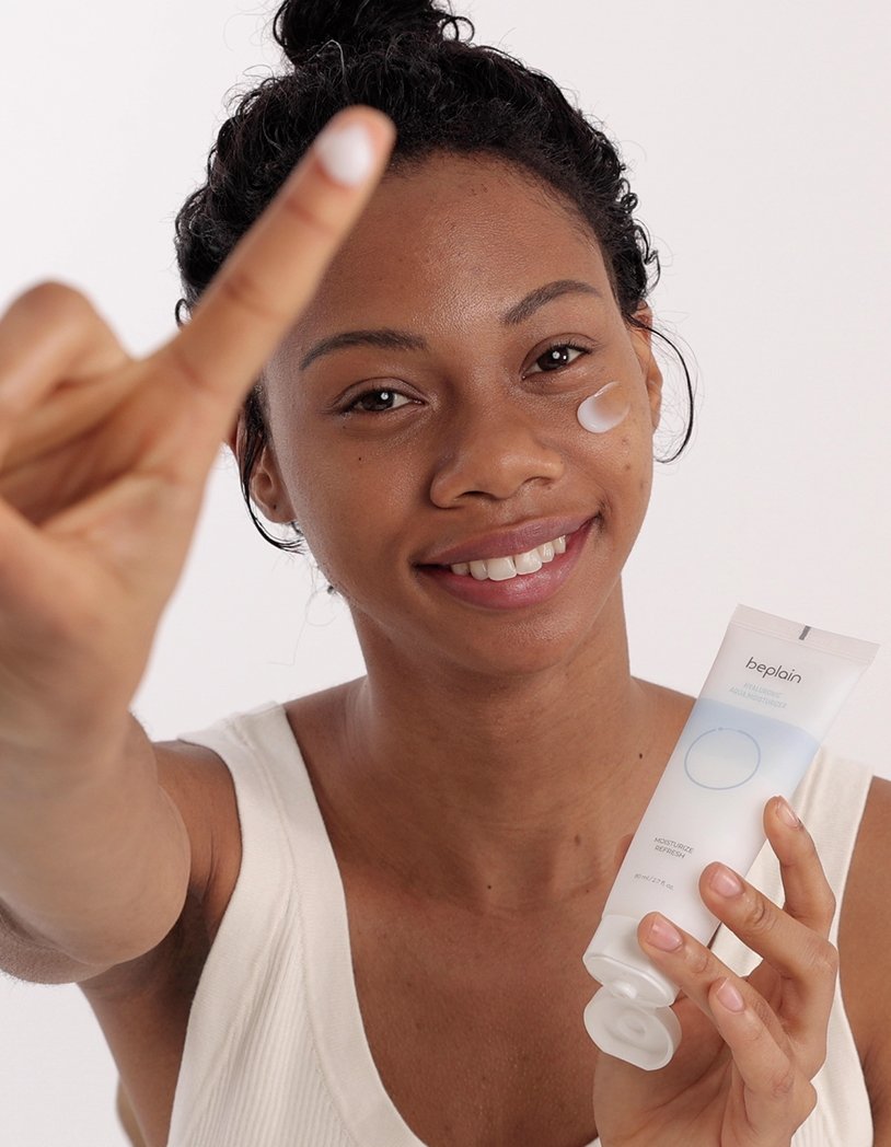 beplain hyaluronic moisturizer black woman applying